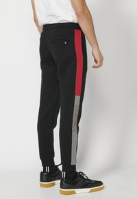 Koroshi JOGGER  - Tepláky - black
