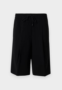 Černé kraťasy z lehké látky, se stahovací šňůrkou v pase, záhyby a rovnými nohavicemi. Jednoduchý a čistý design.