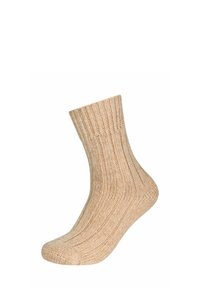 Calza beige a costine con altezza media, caratterizzata da una superficie texturizzata e punte rinforzate per maggiore durata.