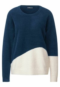 Långärmad tröja med rund halsringning i fluffig textur, med en diagonalt delad design i marinblå och off-white färger.