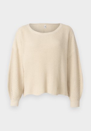 Beige gebreide trui met een ronde halslijn, afgezakte schouders en geribbelde manchetten. De textuur is stevig met een losse, cropped pasvorm.