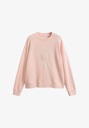 Sudadera rosa claro con cuello redondo y mangas largas, con texto en relieve "GANT 1949" y logo central en el frente.