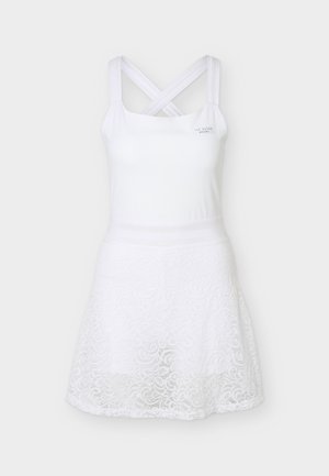 Λευκό αμάνικο φόρεμα με χιαστί τιράντες και φούστα με δαντέλα, με μικρό λογότυπο στο στήθος.