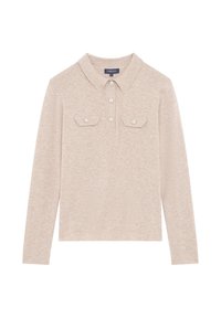 Vaaleanbeige pitkähihainen merkkipaita, jossa on kaulus, kolme nappia edessä ja kaksi rintataskua läpällä ja napilla. Pehmeä rakenne.