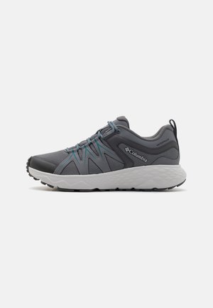 Grå vanntett sneakers med mesh-overdel, kontrasterende blå detaljer, teksturert såle og justerbare lisser for en sikker passform.