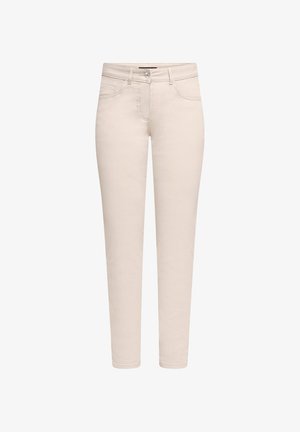 Beige skinny jeans gemaakt van een katoenmengsel. Heeft een gulp met rits, knoopsluiting, vijf zakken en minimale stikseldetails.