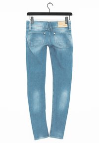 Ljusblå denim skinny jeans med en urvuxen finish, som har en femficksdesign, tunna bältesloopar och subtila sömnadsdetaljer.