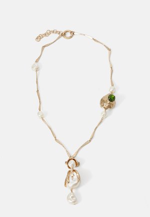 Gold-tone necklace with twisted links, white pearls, and a green stone accent. Features intricate details and a clasp for fastening.
