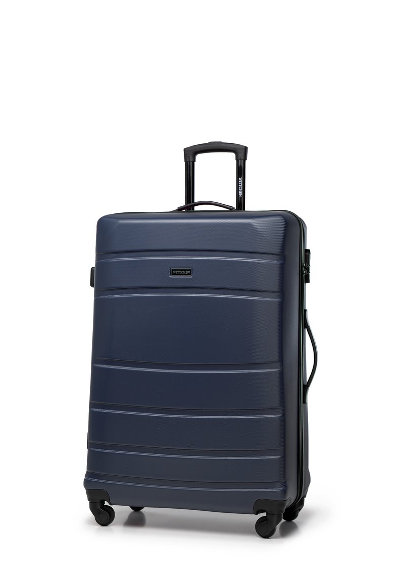 Navy-Hardcase-Reisekoffer mit strukturiertem Finish, horizontalen Linien und einem Teleskopgriff. Verfügt über vier schwarze Rollen für Mobilität.