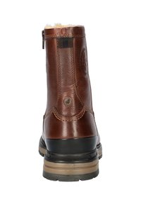 Bruine leren enkelboot met een gestructureerde afwerking, voorzien van een ritssluiting, zachte interieur voering en een stevige rubberen zool.