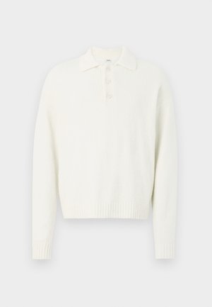 White pullover sweater with a collar, three button front, and ribbed cuffs and hem. Soft, textured fabric with a relaxed fit.