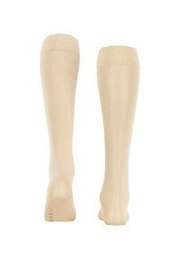 Beige Kniestrümpfe mit glatter Textur, gerippten Bündchen und verstärktem Fersen- und Zehenbereich. Hergestellt aus dehnbarem Material für zusätzlichen Komfort.