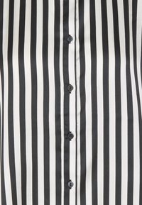 JDY JDYFIFI - Button-down blouse - black/cloud dancer