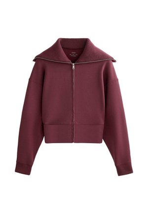 Bordó, rövidített, cipzáras felső nagy gallérral és bordázott szegélyekkel, puha anyagból, enyhe fényű és letisztult dizájnnal.