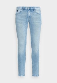 Světlé modré úzké džíny s předním zapínáním na knoflík a zip, pěti kapsami a jemným blednutím na stehnech a kolenou.