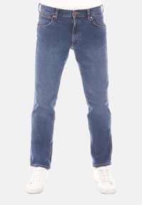 Blauwe denim jeans met vijf zakken, normale pasvorm, rechte pijpen en een knoopsluiting. Voorzien van stikselaccenten en een vervaagde wassing.