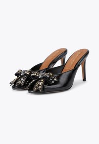 Kurt Geiger London BELGRAVIA STUD BOW - Muiltjes met hak - black comb
