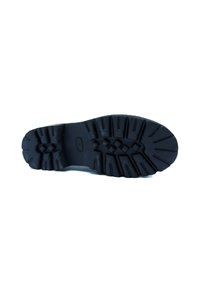 Suola di scarpa nera in gomma con un motivo di battistrada robusto, caratterizzato da scanalature profonde e punte per una maggiore aderenza. Texture liscia con costruzione durevole.