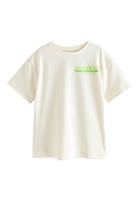 Baumwoll-T-Shirt in cremefarben mit kurzen Ärmeln und rundem Ausschnitt. Mit grünem Grafikdruck mit der Aufschrift "A MINECRAFT MOVIE."