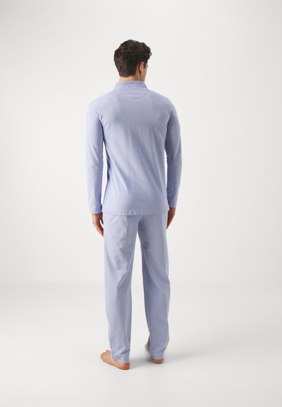 Light blue long-sleeve top and matching pants made of soft fabric, featuring a round neckline and straight-cut design.