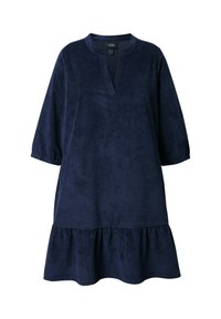 Sotilaallansinisestä koriseva polven pituinen mekko, jossa on 3/4-hihat, V-muotoinen kaula-aukko ja frillahelma.