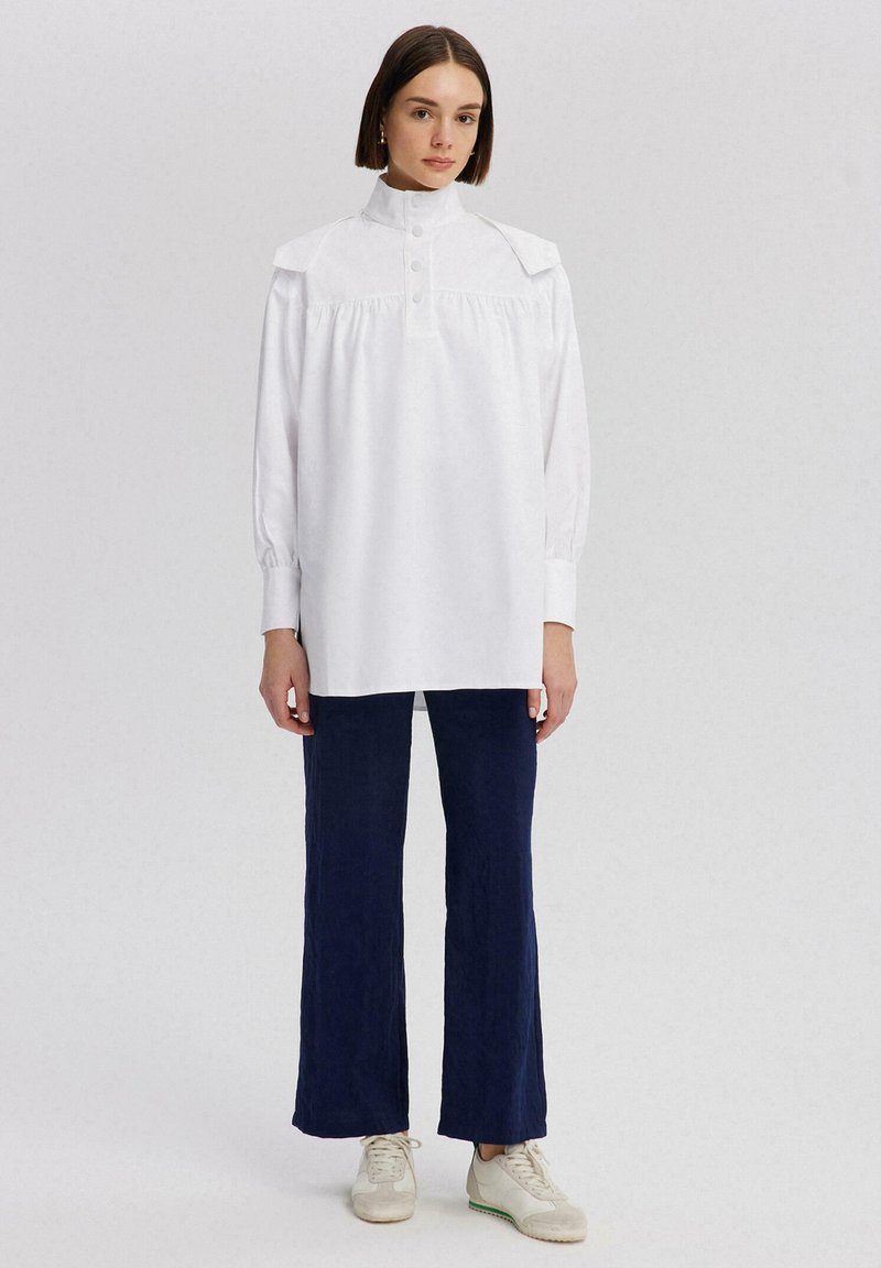 Touché Privé Lichte jas wit