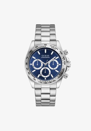 Montre chronographe Guess en métal argenté avec cadran bleu, trois sous-cadrans, index lumineux et bracelet à maillons en acier inoxydable.