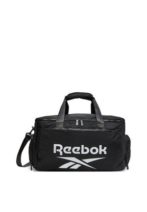 Borsa da palestra nera Reebok con doppie maniglie, tracolla staccabile, tasca frontale con zip e grande logo bianco.