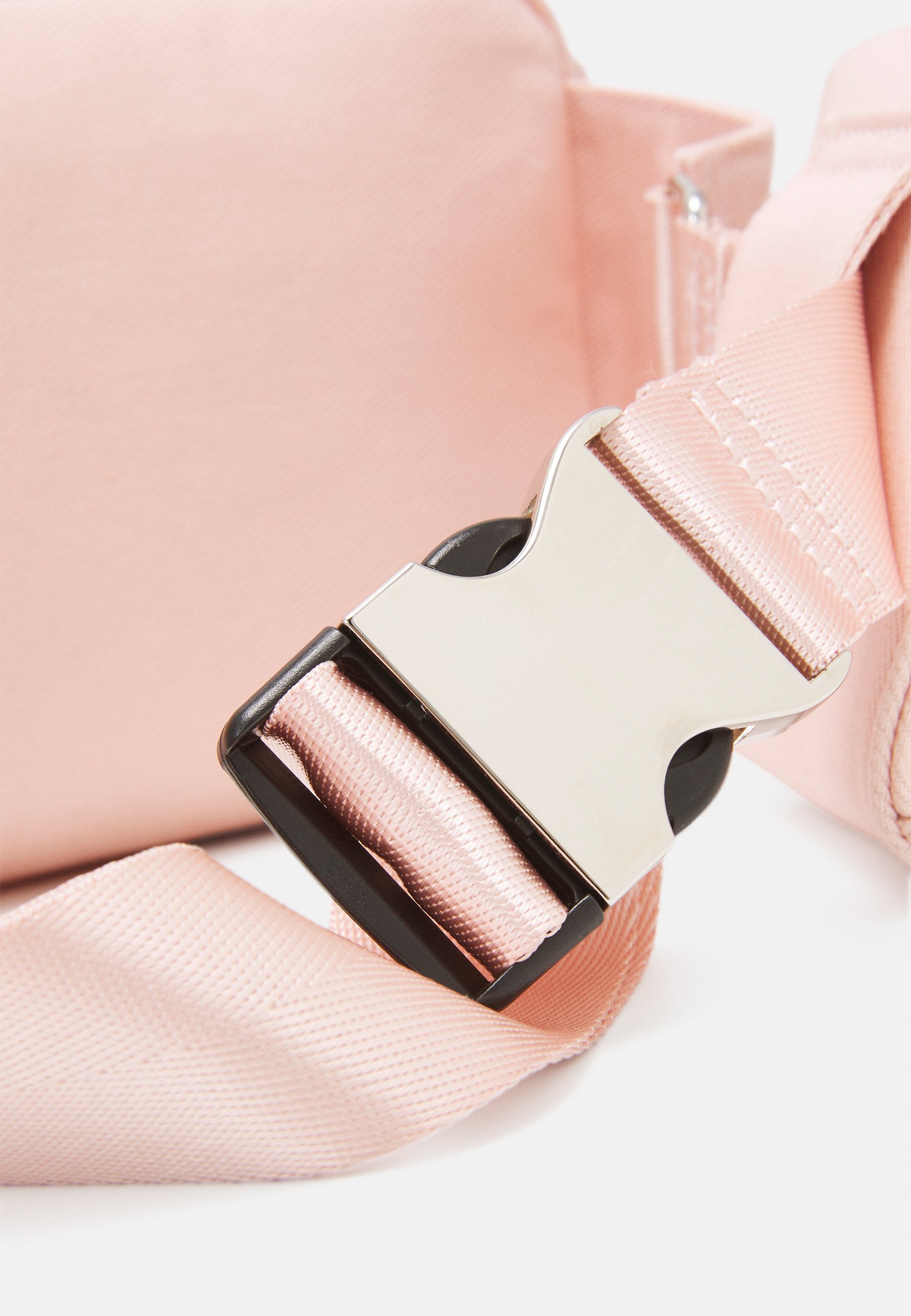 blush belt bag