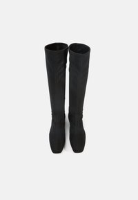 Over-the-knee black boots with a sleek, fitted design. They feature a smooth texture, pointed toe, and minimal stitching details.