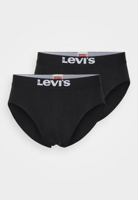 Caleçons noirs en coton avec une ceinture élastique logoée. Deux paires présentées avec une texture lisse et un design classique.