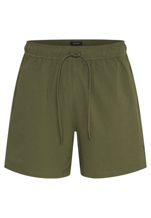 Maslinaste zelene kratke hlače od teksturirane tkanine, s elastičnim pojasom koji se može podešavati uzicom, te bočnim džepovima za praktičnost.