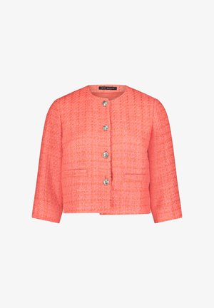 Koraal tweed jasje met een ronde halslijn, lange mouwen en vier zilveren knoopsluitingen. Bevat twee voorkruim pockets. Gelaagd stof.