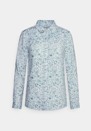 Camisa de botão de manga longa em branco com padrão floral verde. Apresenta um colarinho e uma bainha reta. Feita de tecido leve.