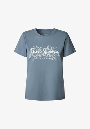 Hele sinine puuvillane t-särk lühikeste varrukatega ja ümarate kaelustega. Keskosas on valge lillemuster ja tekst "Pepe Jeans London".