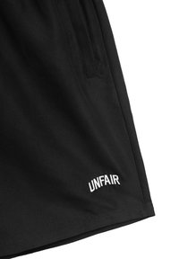 UNFAIR ATHLETICS CURVED - Tréningruha alsók - black