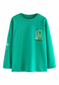 T-shirt a maniche lunghe verde realizzato in cotone. Presenta una grafica sul petto e del testo lungo la manica. Vestibilità comoda, colletto a costine.