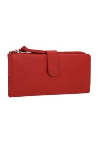 Red leather wallet with a smooth texture, zip closure, and a front flap. Features a wrist strap and embossed logo on the front.
