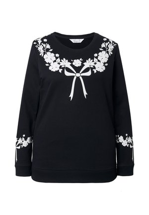 Černá mikina s bílými květinovými vzory a motivy mašlí na hrudi a rukávech. Vyrobena z měkké látky, s kulatým výstřihem a dlouhými rukávy.