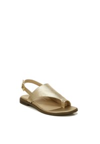 Gold metallic slingback sandal with a toe loop, smooth upper, adjustable ankle strap, and flat sole. Simple design with a sleek appearance.