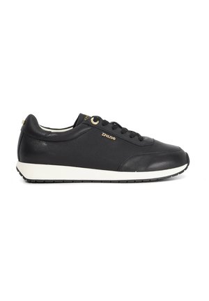 Black low-top sneaker with white sole, lace-up front, and gold "Dune" logo on the side.