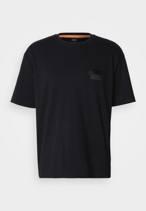 Black short-sleeve crew neck T-shirt with subtle dark logo on left chest and orange inner neckline detail.