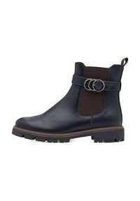 Bottines en cuir bleu marine avec un panneau élastique marron, des accents en anneau argenté et une semelle en caoutchouc texturée.