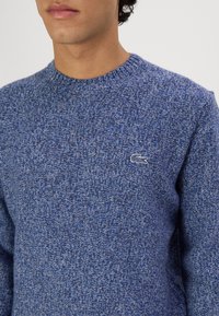 Lacoste Džemperis - navy neps