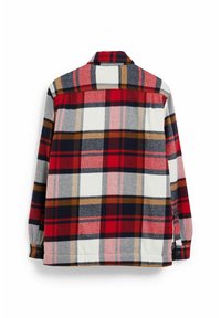 Rutig flannel skjorte i rød, sort, hvid og tan. Har krave, lange ærmer og et løst design med en blød tekstur.