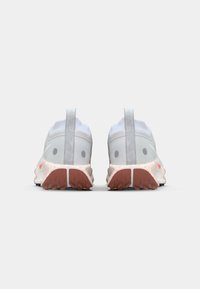 Lightweight running shoes with a white upper, grey accents, and a pink and orange speckled sole. Features a pull tab for easy wear.