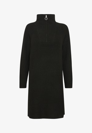 Mustmust dress kõrge kraega ja luku sulgemisega. Omab tekstuurilist mustrit ja pikki varrukaid. Üksik joonega.