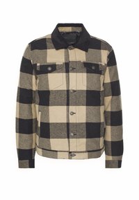 Beige og sort storternet knapjakke med lange ærmer, to brystlommer med klap og en sort krave.