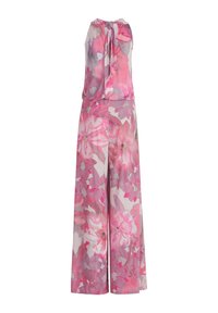 Combinaison sans manches en tissu léger à motifs floraux, présentant des teintes de rose et de gris, avec un nœud à l'arrière et des jambes larges.