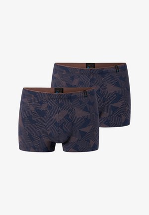 Deux paires de boxers bleu marine avec des motifs géométriques bruns en lignes et des ceintures brunes, étiquetées "Long Life Soft".